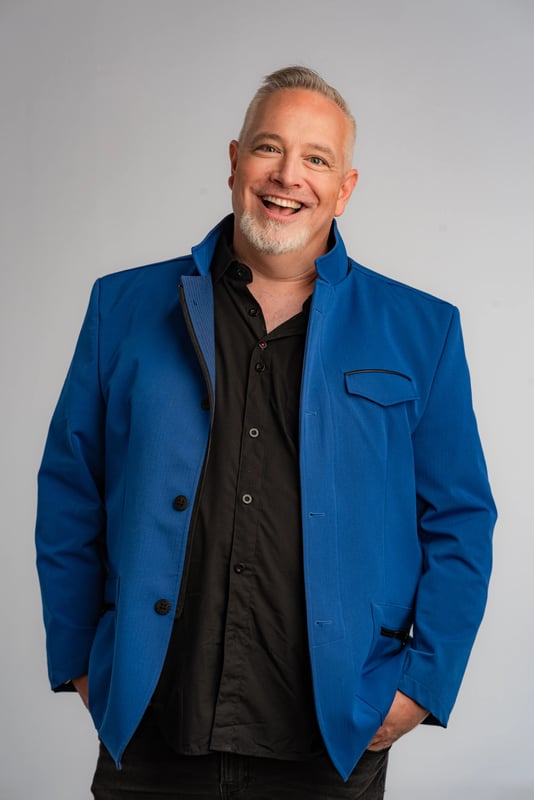 Derrick Mains (blue jacket) Vertical